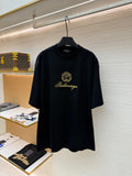 Dark short-sleeve T-shirt with Balenciaga gold crest and script logo