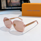 Pink sunglasses with gold temple detailing and light rose lenses