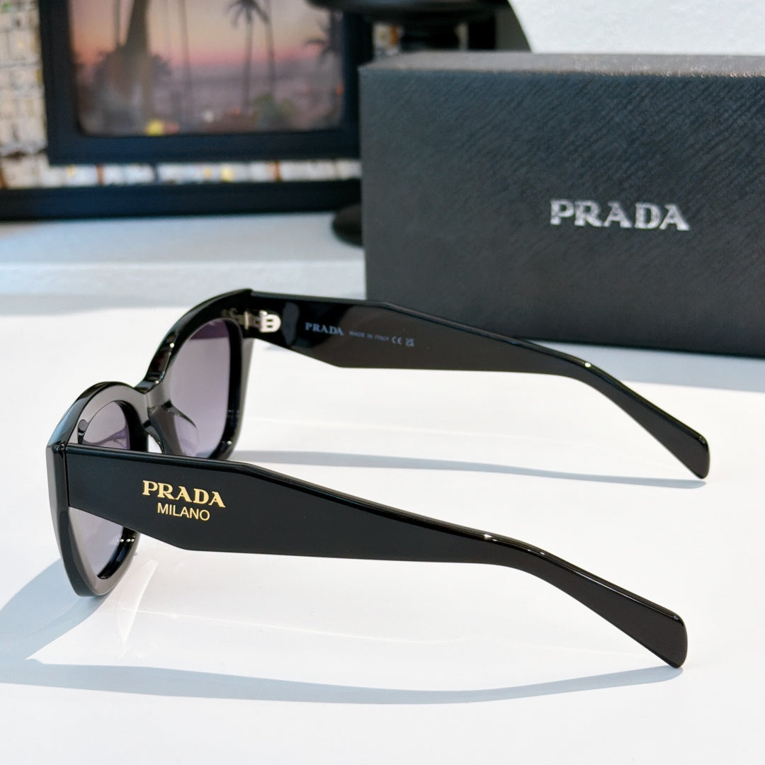 Prada sunglasses with glossy black frames and tinted lenses, thin arms with logo