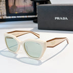 Prada sunglasses with white frames and light green tinted lenses, square cat-eye style