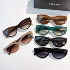 Prada sunglasses assortment with mixed frames and tinted lenses.