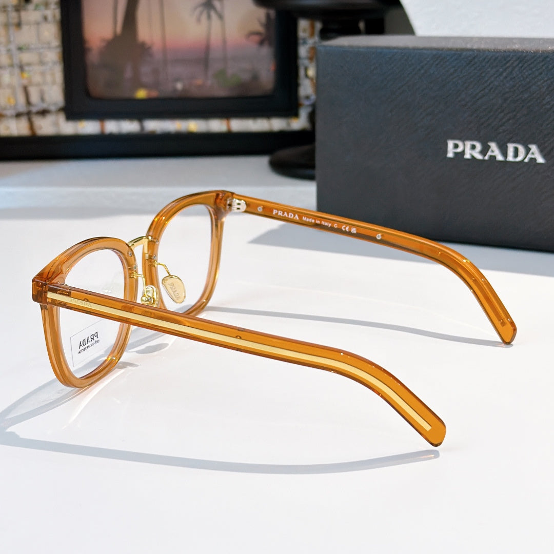 Prada eyeglasses side profile with honey-tan full-rim frames and gold metal temples.