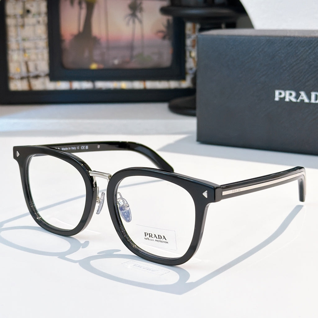 Prada eyeglasses with black full-rim rectangular frames and silver metal temples.