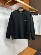 Black sweatshirt with small Versace chest logo, crew neck, long sleeves