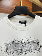 White crewneck collar with rhinestone logo across chest