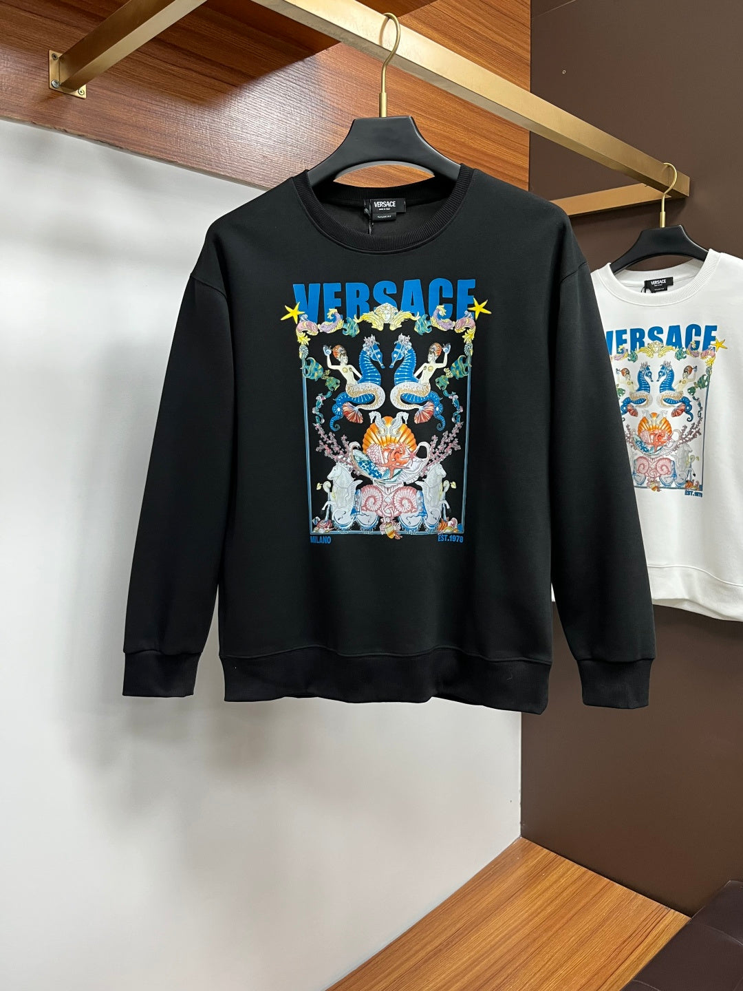 Black crewneck sweatshirt with Versace logo graphic front