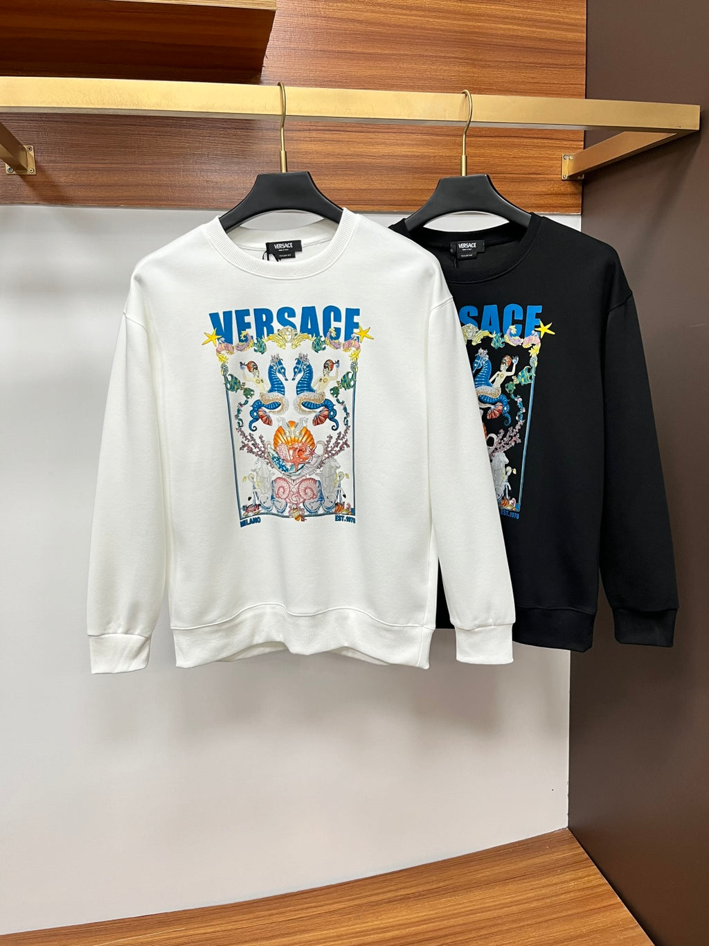White crewneck sweatshirt with Versace logo graphic front