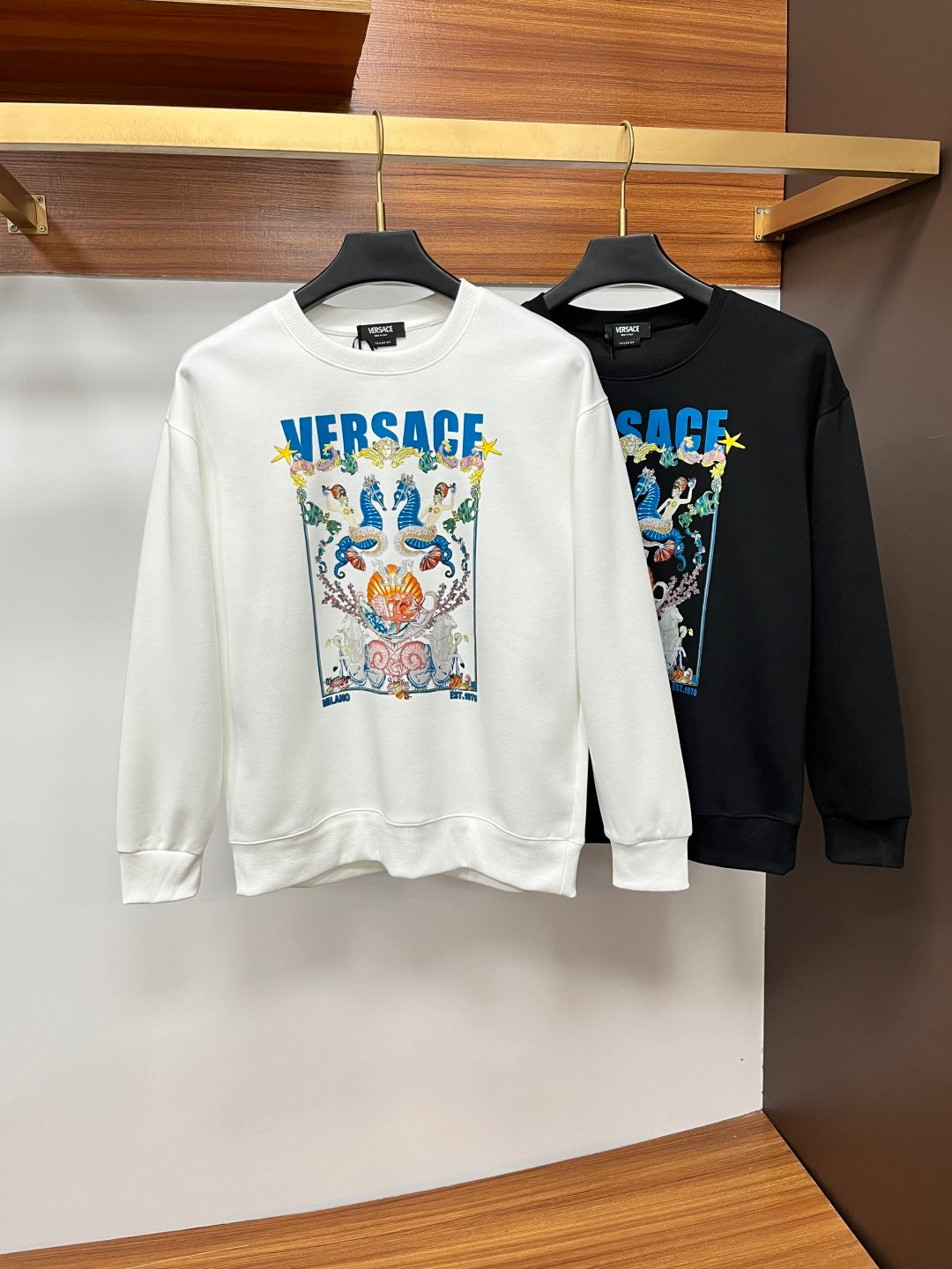White crewneck sweatshirt with Versace logo graphic front