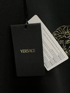 Black sweatshirt with VERSACE paper hang tag