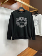 Black crewneck sweatshirt with rhinestone VERSACE Milano crest graphic on front