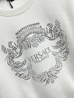 White sweatshirt with rhinestone circular crest and VERSACE MILANO
