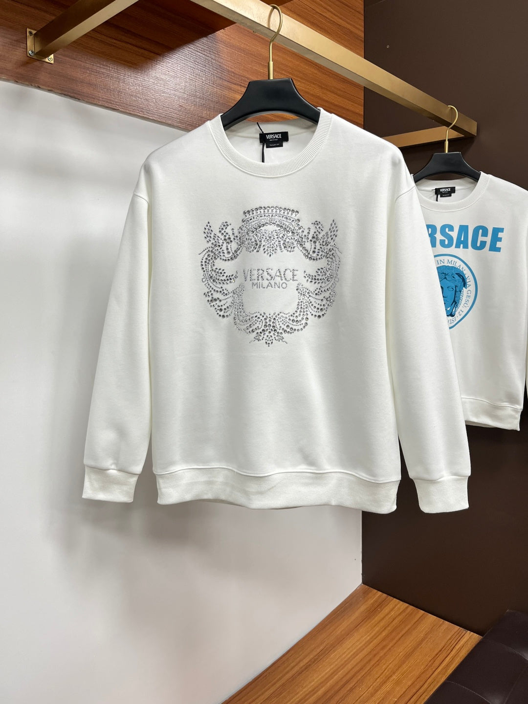 White crewneck sweatshirt with crystal-style Versace logo print