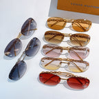 Louis Vuitton sunglasses set with gold chain temples and multiple colored gradient lenses