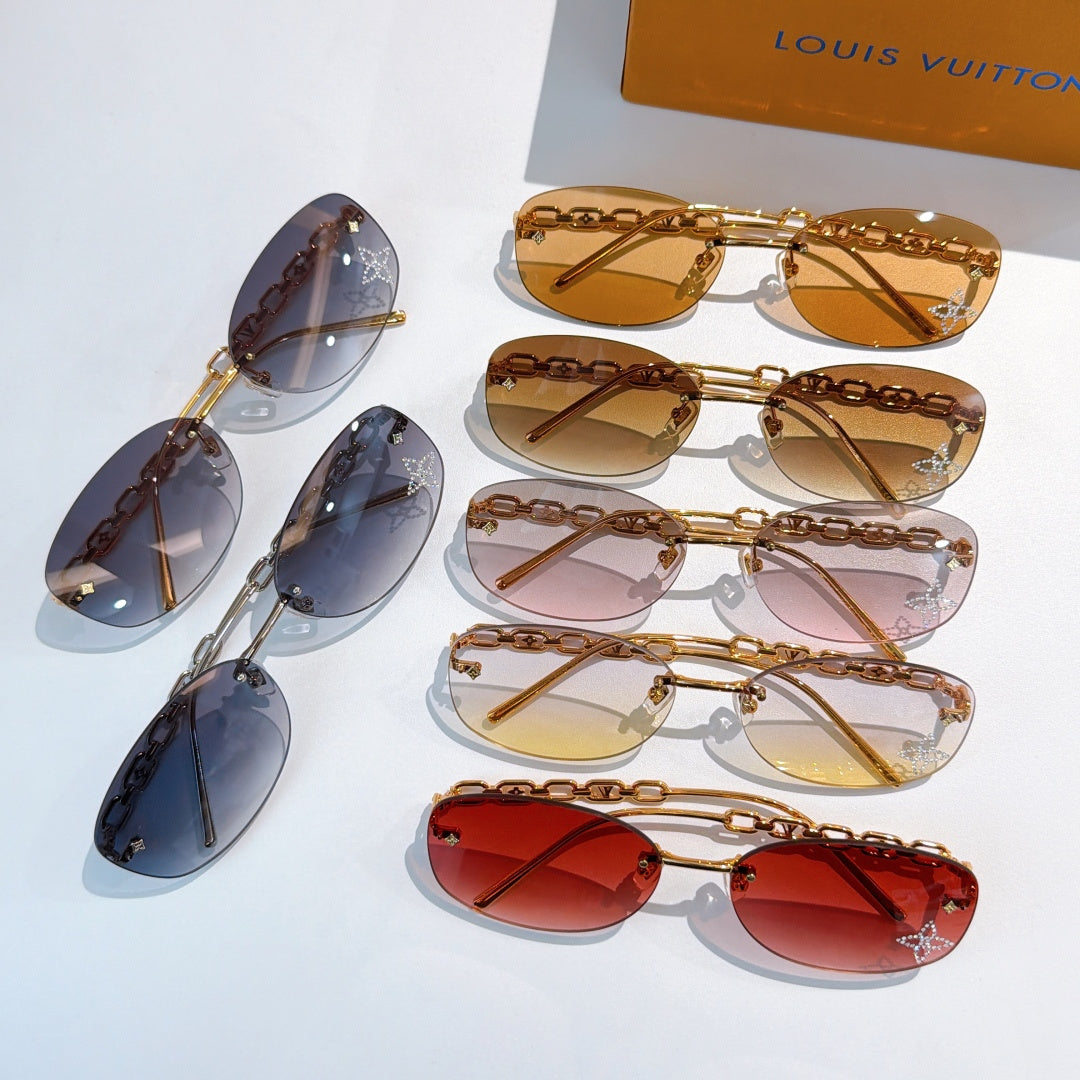 Louis Vuitton sunglasses set with gold chain temples and multiple colored gradient lenses
