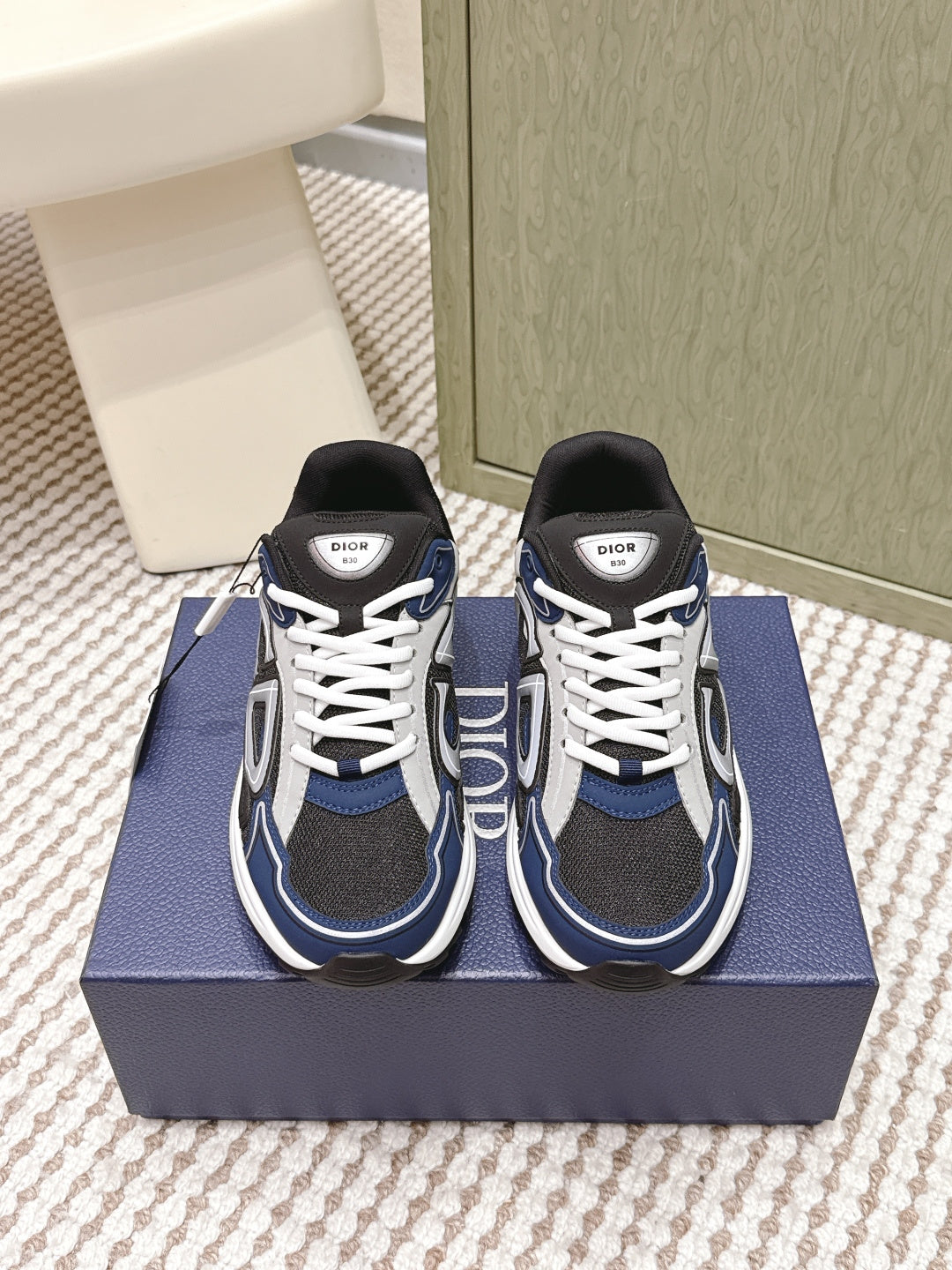 Dior unisex sneakers, navy and black with white laces and swoosh-like panels