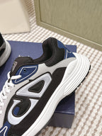 Dior unisex sneakers side detail, black and navy with white midsole and thick sole