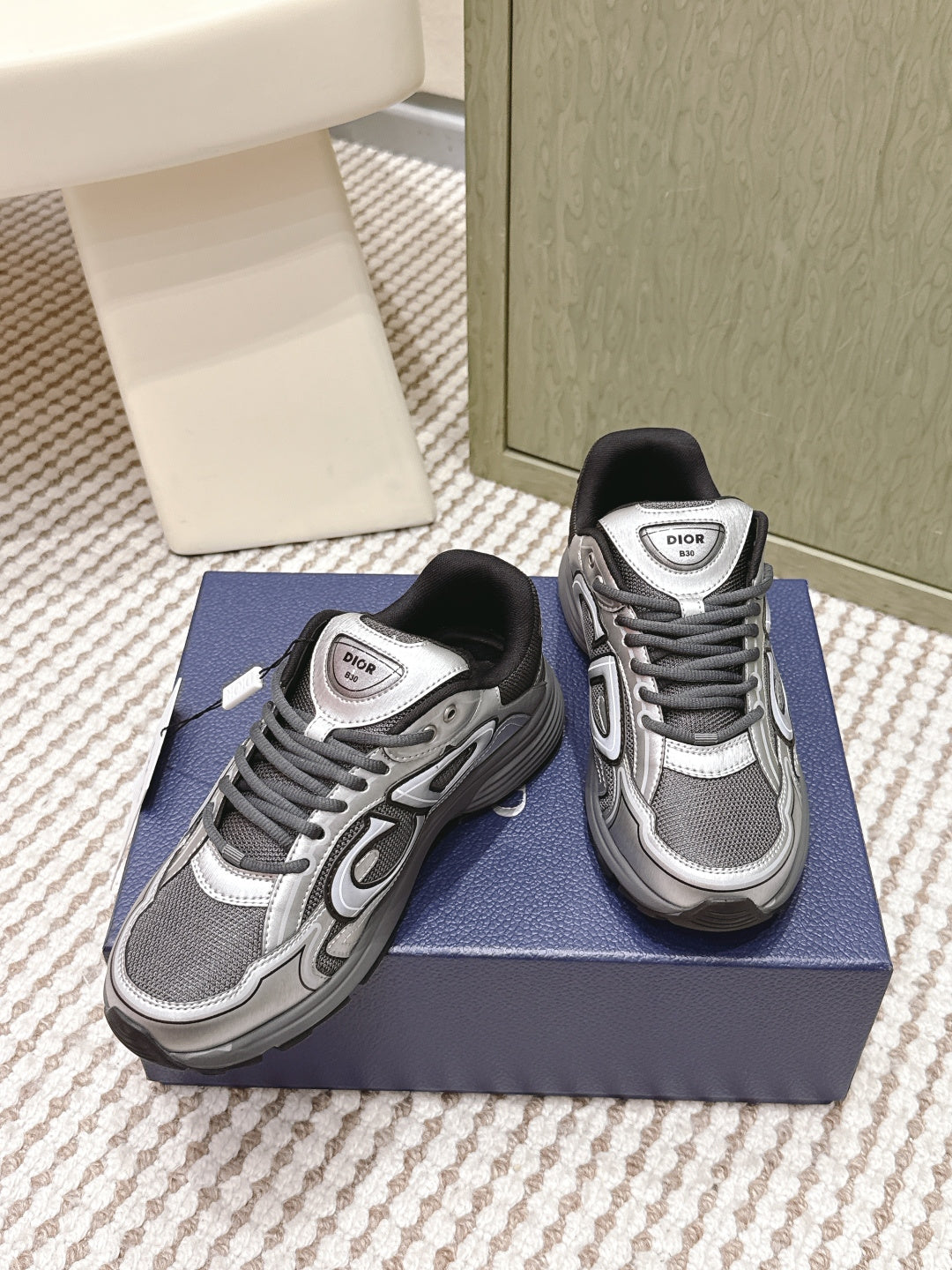 Dior unisex sneakers, two pairs on box, grey mesh with white overlays and black cuffs