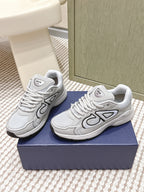 Unisex lace-up sneakers in light gray/white with bold Dior-style side logo detail