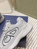 Unisex sneaker with sculpted sole and large Dior-style side emblem, close-up