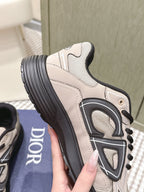 Unisex low-top sneakers, beige with thick black sole and raised rear logo