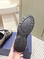Unisex sneaker outsole, dark rubber tread with Dior heel logo