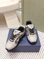 Unisex low-top sneakers, light beige with black laces and strap detail on tongue