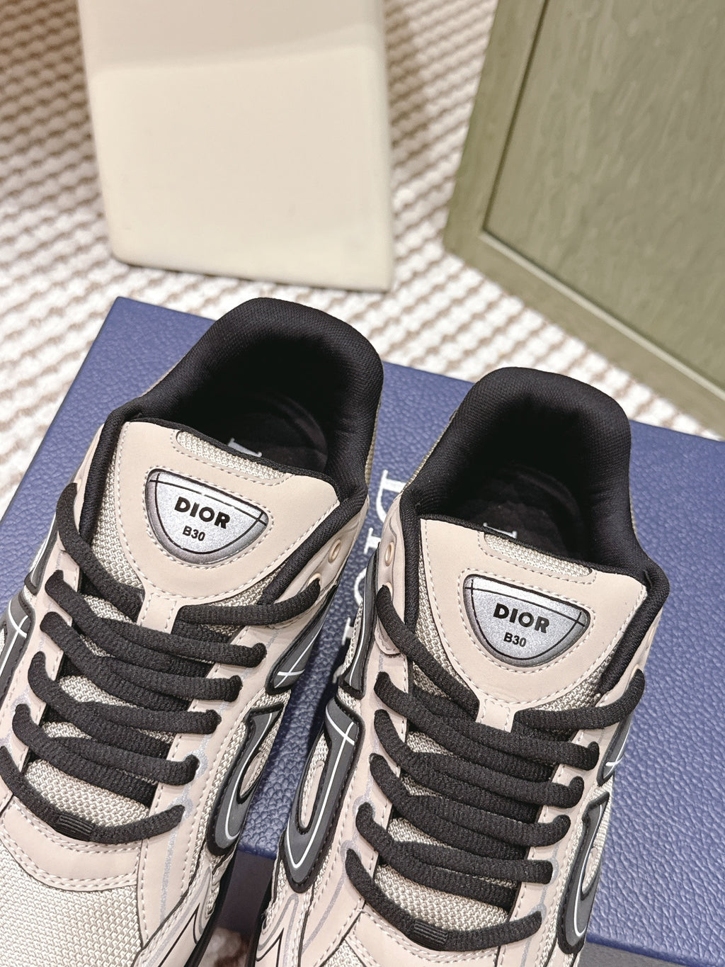 Unisex low-top sneakers, beige uppers with black tongue lining and Dior label