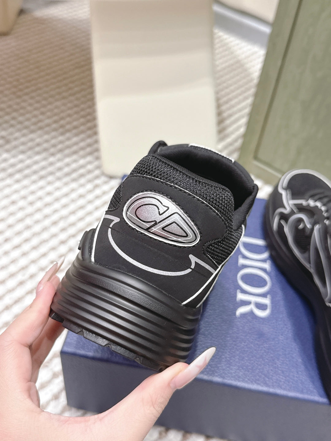 Black lace-up sneaker heel with large Dior logo and ribbed sole detail