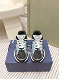 Dior unisex sneakers, black and white with turquoise accents, lace-up on box