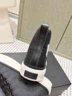 Amiri black Chelsea-style high-top sneaker with elastic collar and white rubber sole
