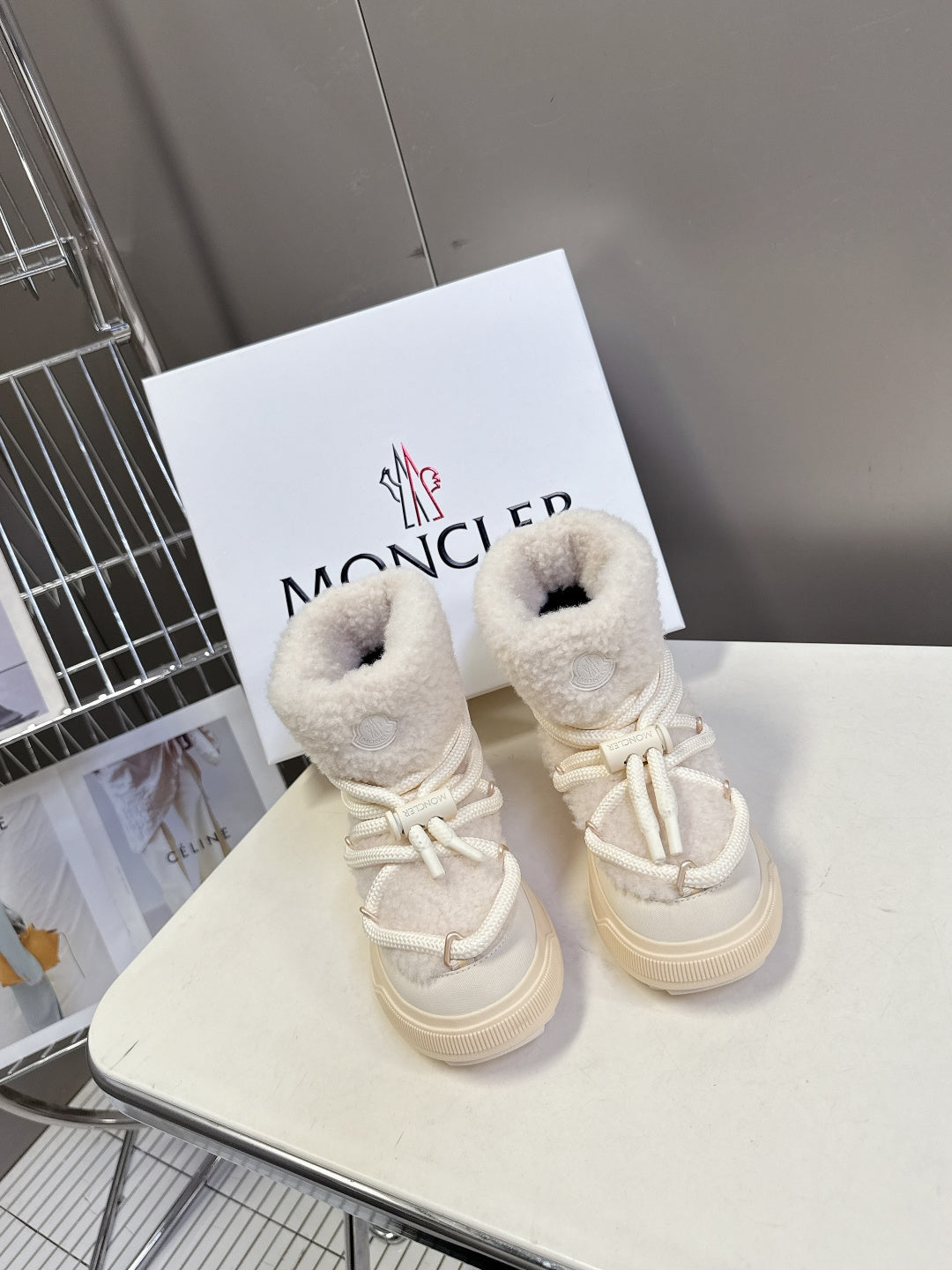 Cream fur-lined lace-up sneakers with white rope laces and cushioned collar