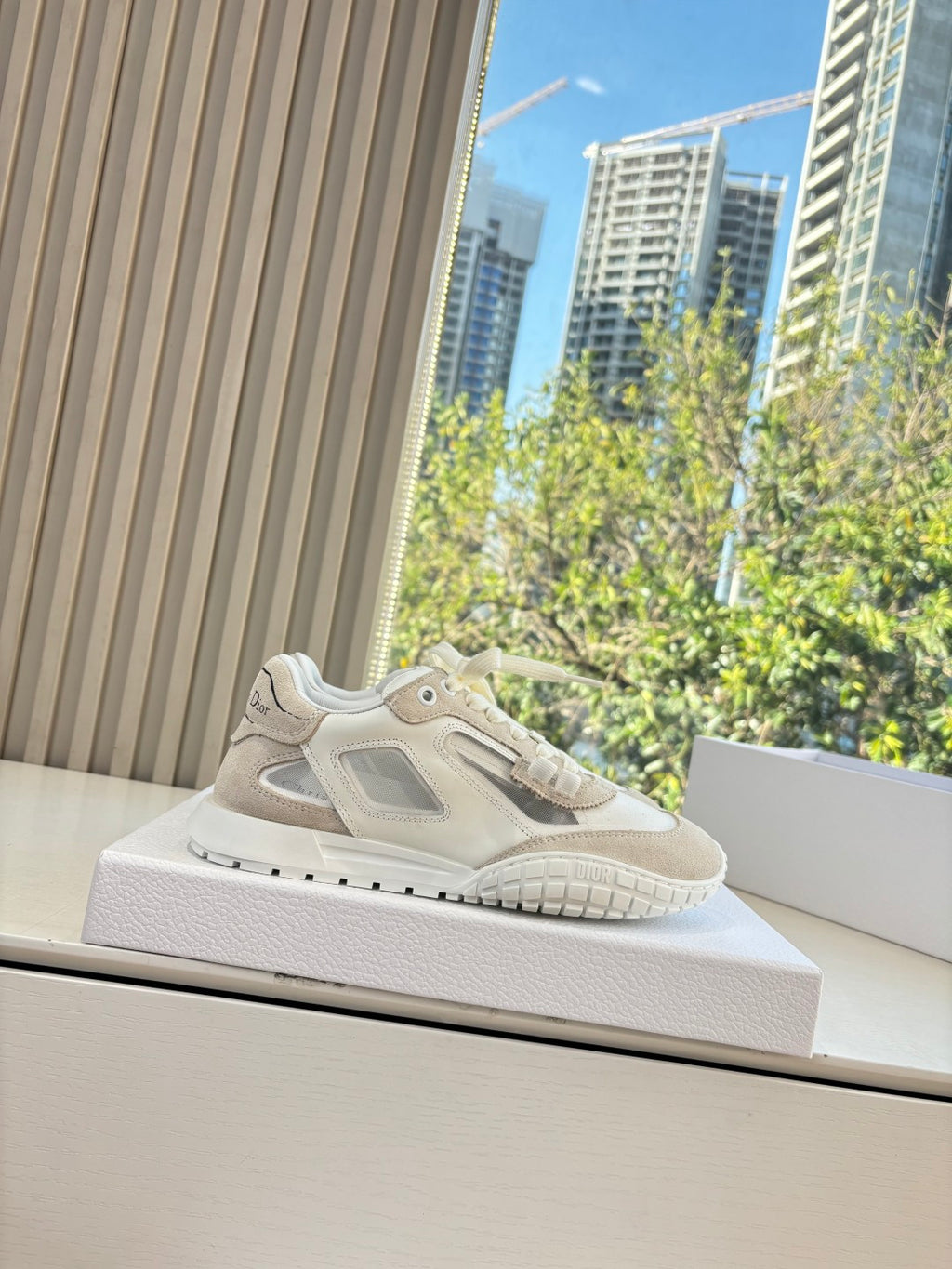 Unisex cream sneakers with lace-up design and cushioned midsole