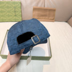 Gucci navy blue cap with adjustable buckle strap on the back closure