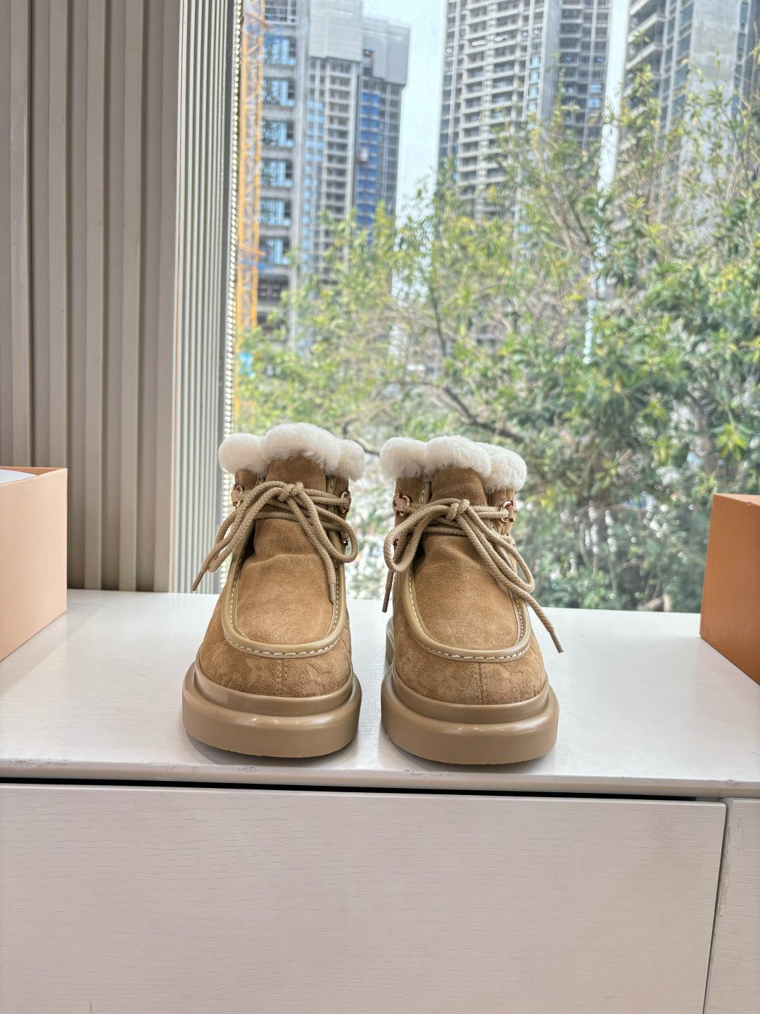 Louis Vuitton unisex lace-up shoes in tan suede with fuzzy shearling lining and trim