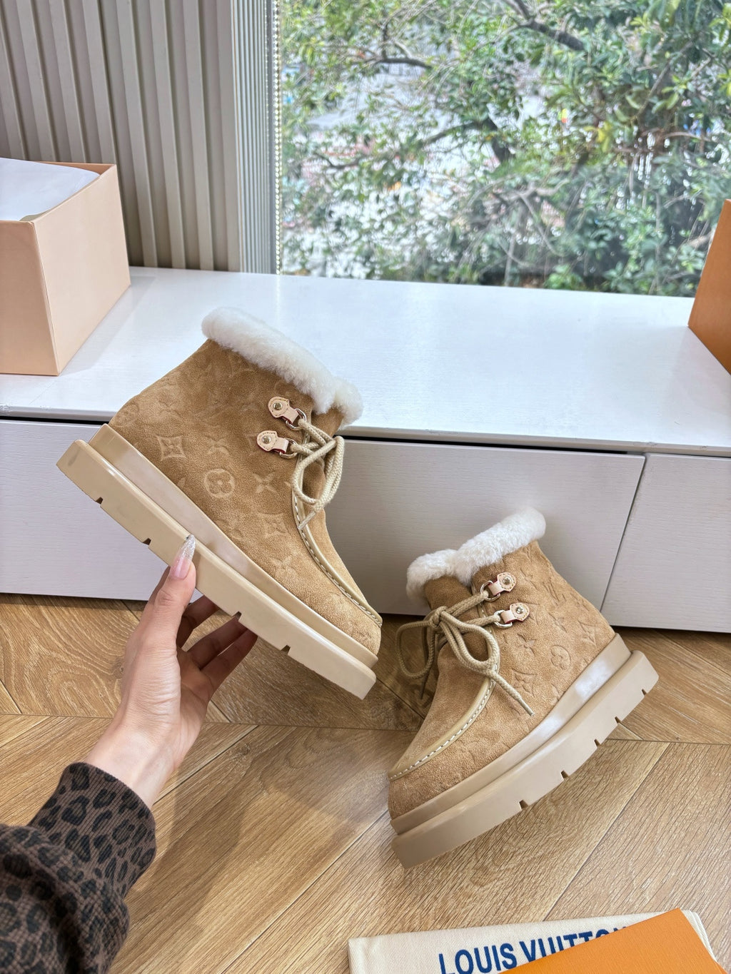 Louis Vuitton unisex tan lace-up shoes showing front straps and shearling lining