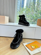 Unisex Louis Vuitton black monogram ankle boots with faux fur lining and lace-up ties