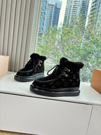 Unisex Louis Vuitton black monogram high-top boots with faux fur cuffs and lace-up