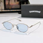 Round sunglasses with light blue lenses and silver metal frame, thin arms.