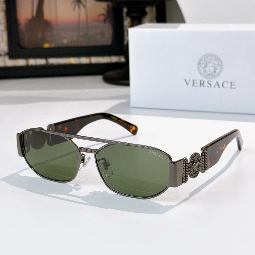Versace sunglasses with dark frame and green lenses, patterned temple band detail