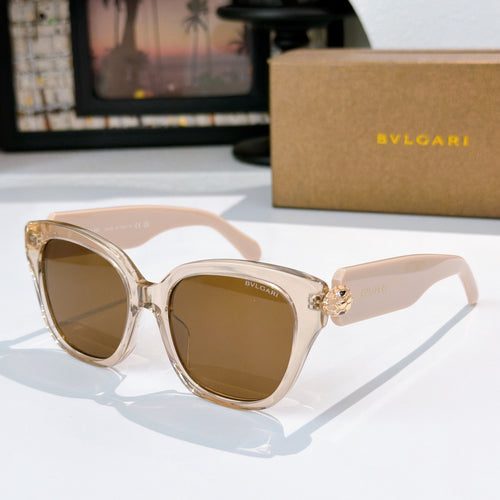 Bvlgari sunglasses with light gold frames, brown square lenses, and jewel bridge detail
