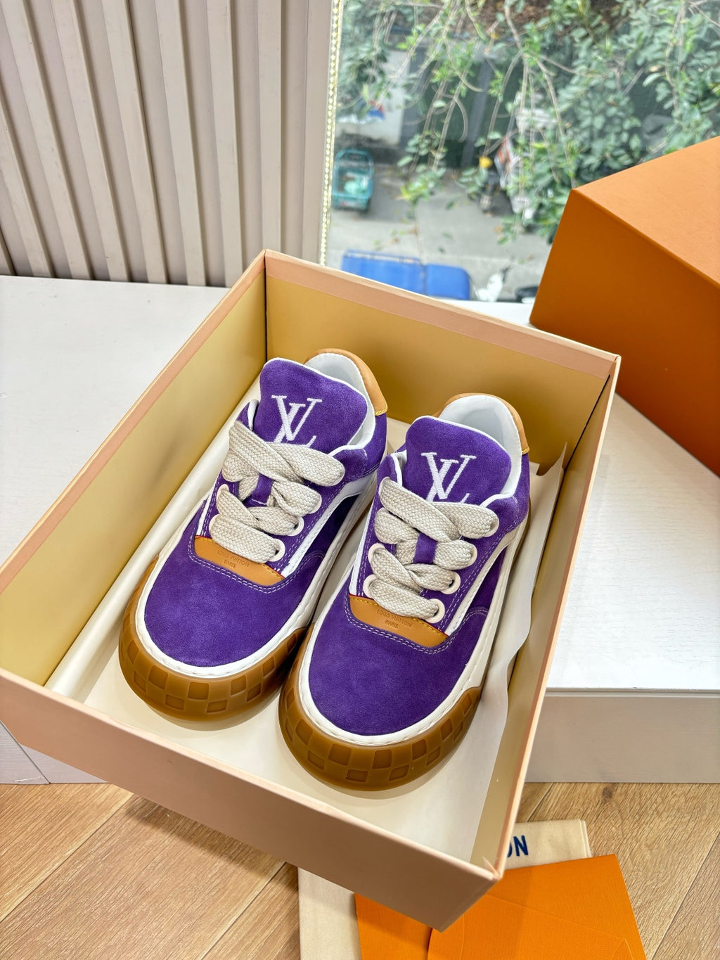 Louis Vuitton unisex purple low-top sneakers with white laces, white midsole, gum sole