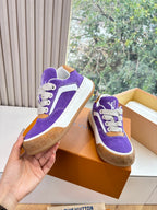 Louis Vuitton purple suede sneakers with white laces and tan/brown side panel accent