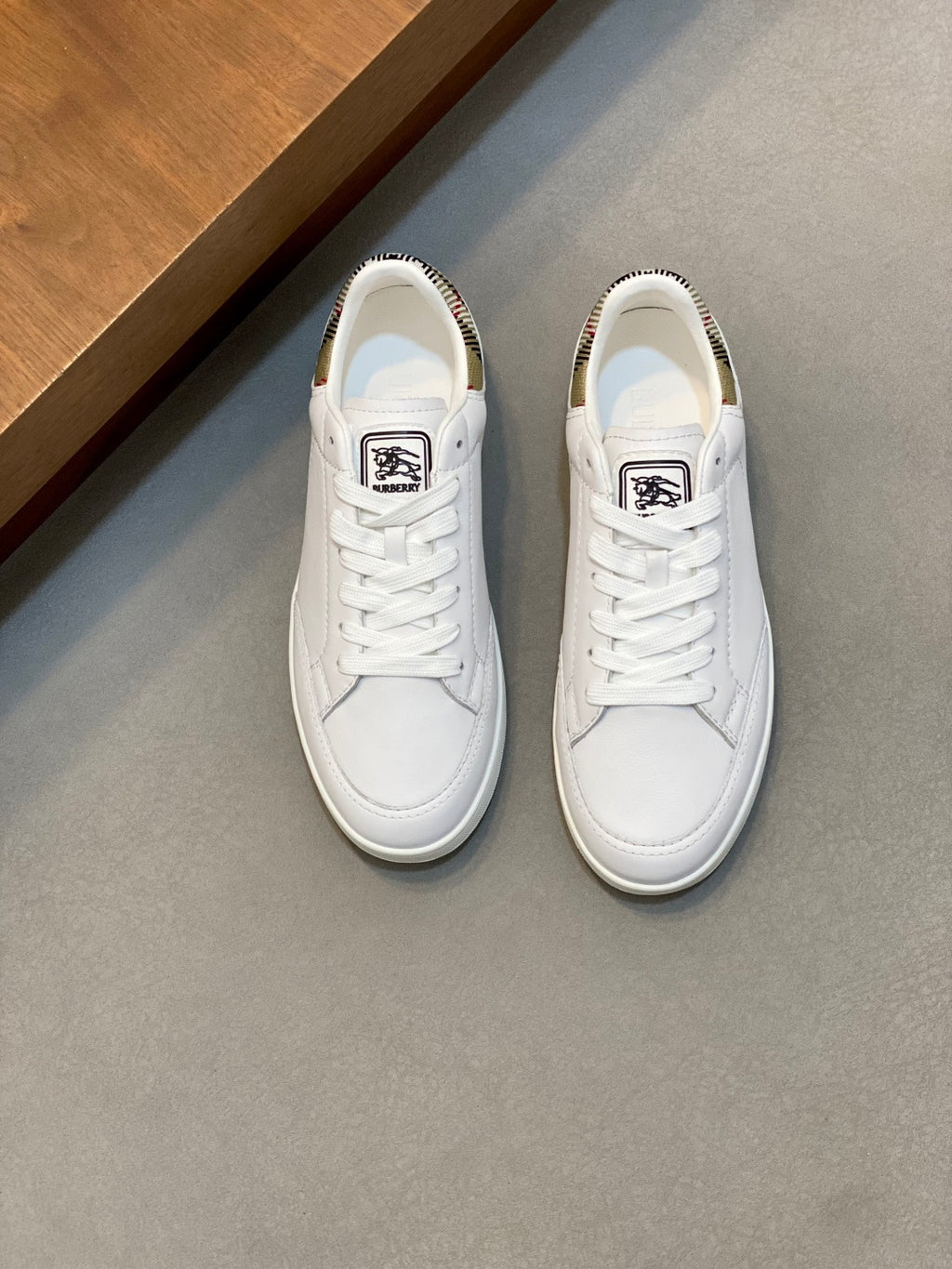 Burberry white leather low-top sneakers with white laces and side logo patch