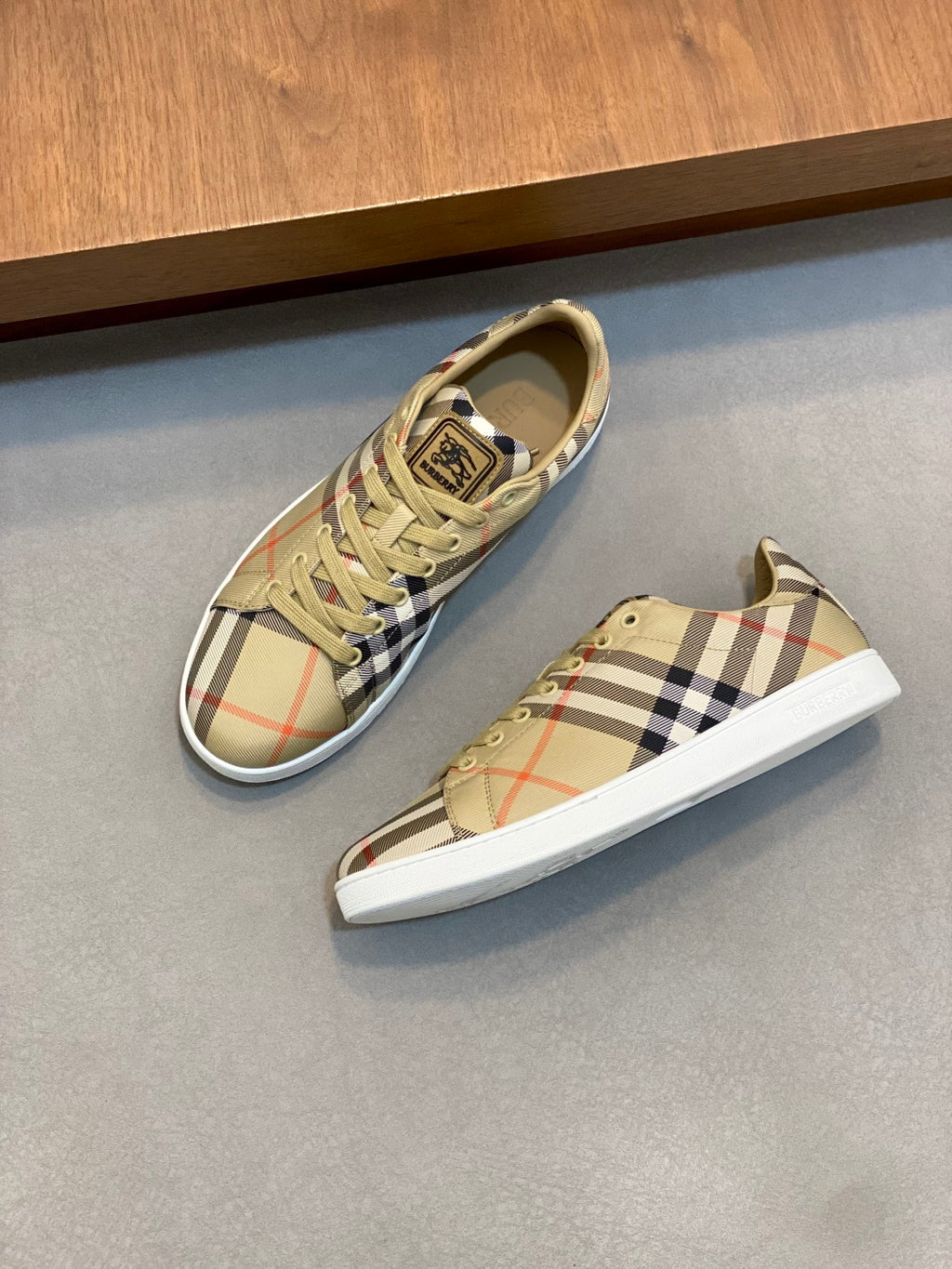 Burberry check low-top sneakers, pair view, beige plaid upper, white rubber sole