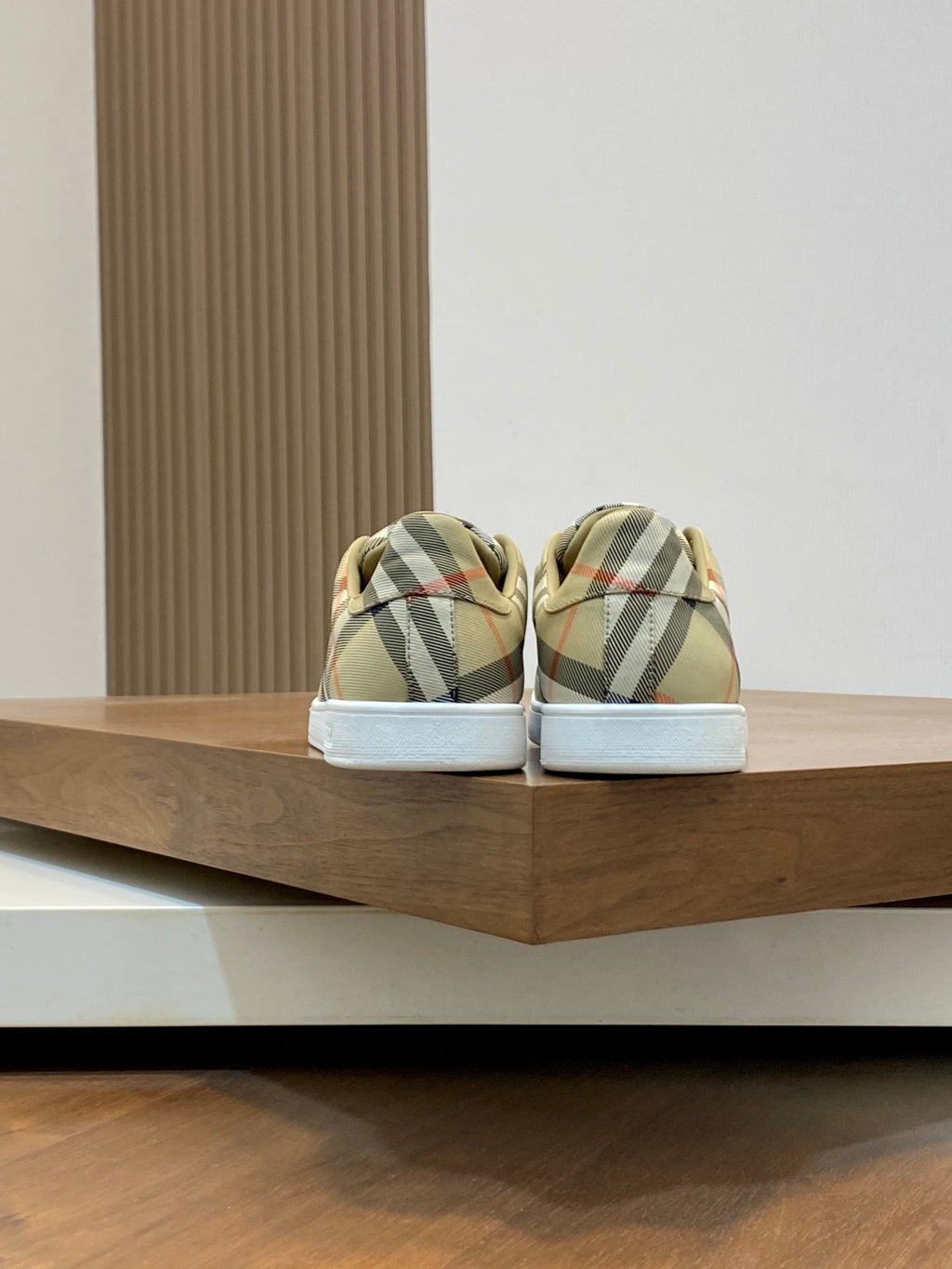 Burberry check low-top sneakers, heel view, beige plaid with white sole