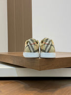 Burberry check low-top sneakers, heel view, beige plaid with white sole
