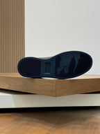 Navy-blue sneaker outsole with tread pattern