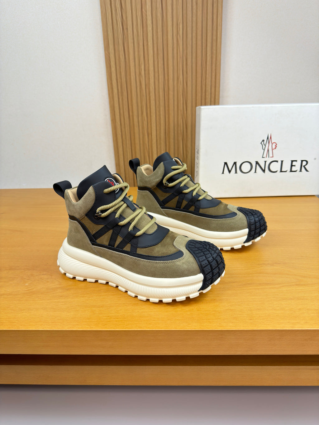 Moncler sneakers in olive and black with neon-yellow laces and thick white sole