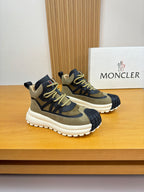 Moncler sneakers in olive and black with neon-yellow laces and thick white sole