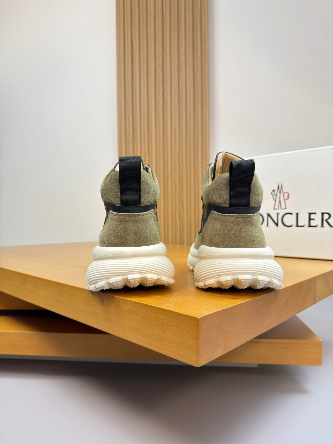 Moncler sneakers back view pair: black heel tabs, olive upper, white sole